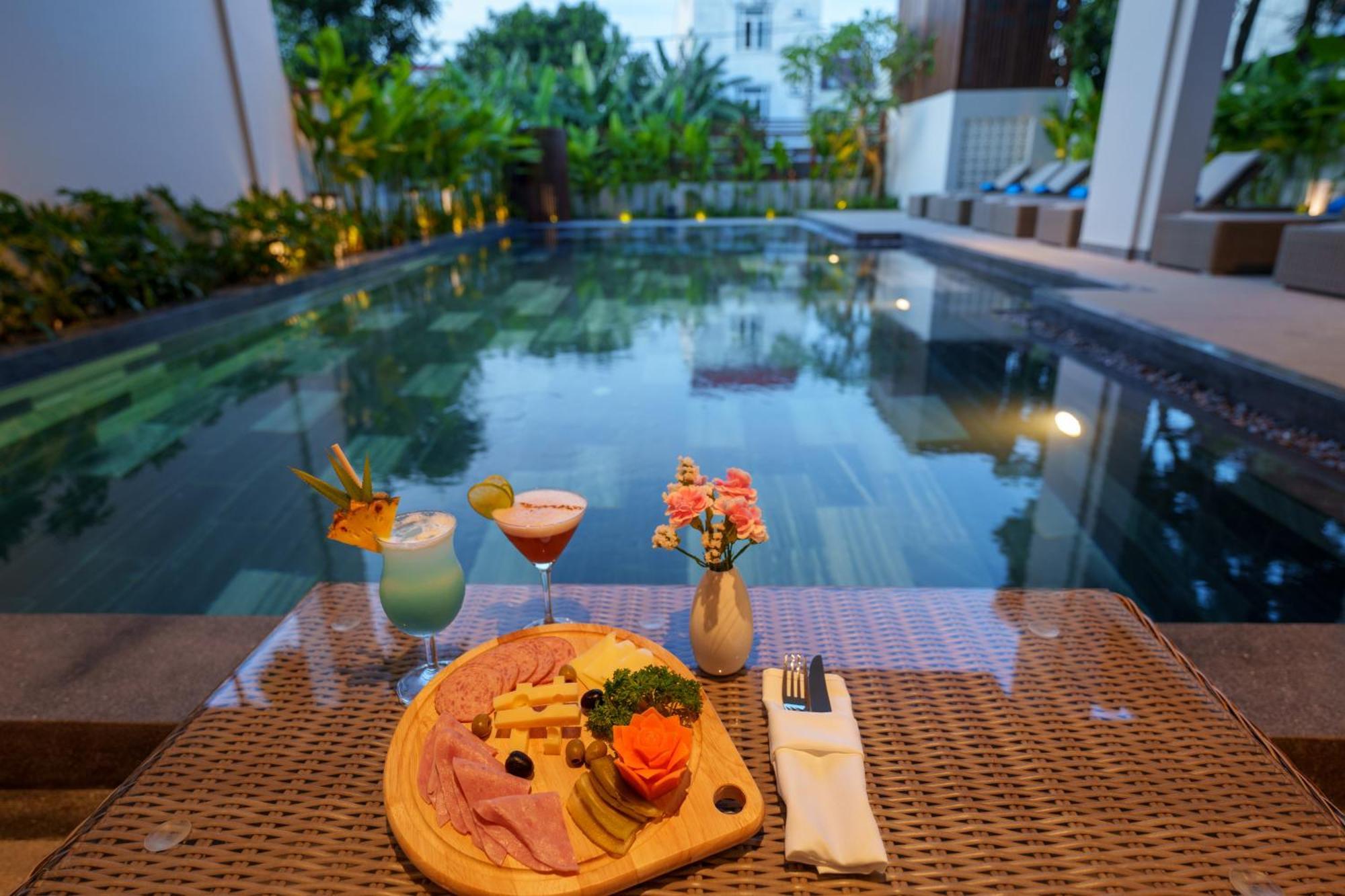 Cozy An Boutique Hotel Hoian ホイアン エクステリア 写真